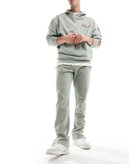 Joggers caquis con emblema de The Couture Club