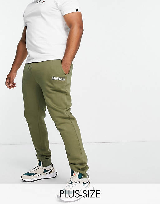 Hombre Pantalones y mallas | Joggers caquis con logo de ellesse Plus - OK86110