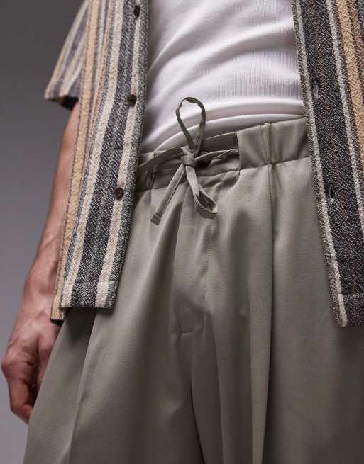 Joggers caquis de pernera holgada con cintura elástica anudada de Topman, 5 de 5