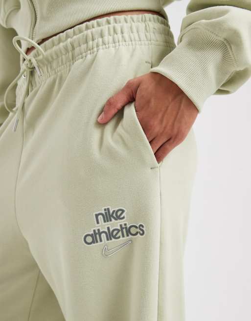 Joggers caquis de talle alto y pernera ancha Phoenix Fleece de Nike, 3 de 5