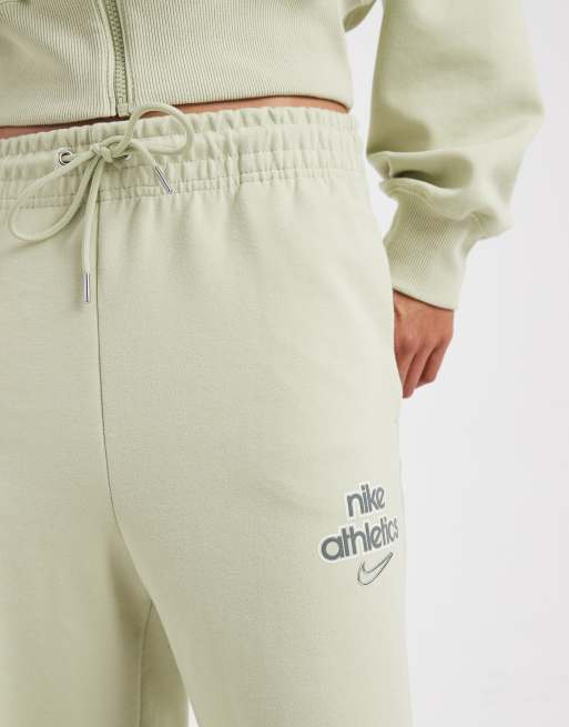 Joggers caquis de talle alto y pernera ancha Phoenix Fleece de Nike, 4 de 5
