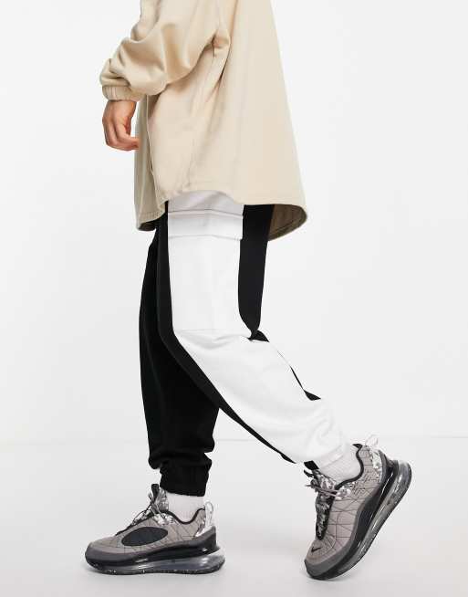Joggers cargo extragrandes con diseño color block negro y blanco de ASOS DESIGN