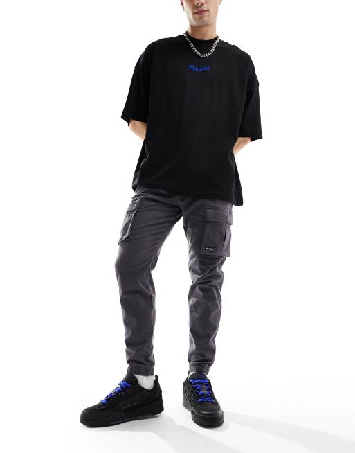 Joggers cargo gris oscuro de corte pitillo con bolsillo frontal de Hollister