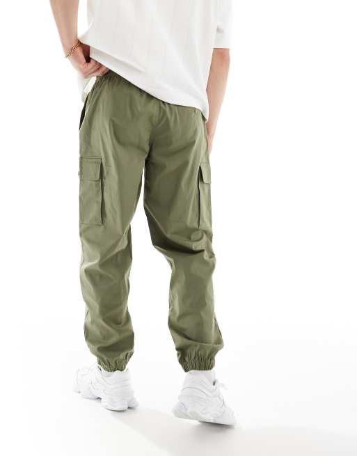 Joggers cargo verdes de sarga de New Balance, 4 de 5