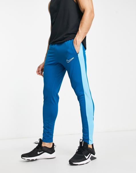  Pantalones deportivos de entrenamiento de fútbol para hombre,  pantalones deportivos de corte ajustado, bolsillos con cremallera a rayas,  negro - raya azul : Ropa, Zapatos y Joyería