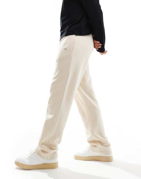 Joggers color crema de pernera ancha con logo de New Era - view 1