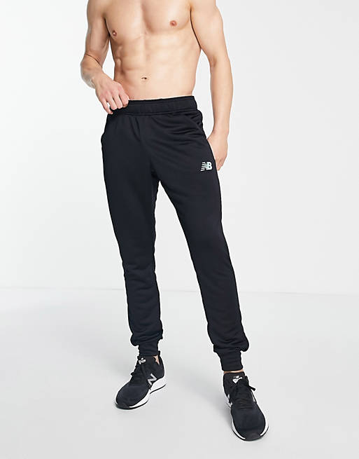 Hombre Joggers de ropa deportiva | Joggers color negro y aguamarina de corte slim exclusivos en ASOS de New Balance Football - QM10236