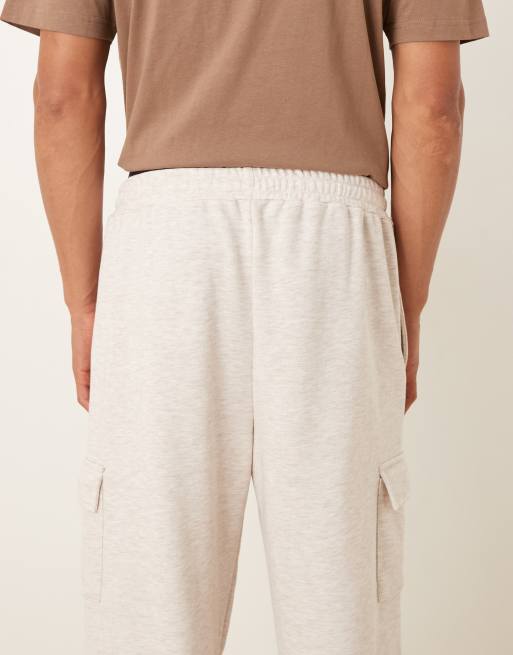 Joggers color piedra de corte tapered con bolsillos estilo cargo de tejido rizado de ASOS DESIGN, 5 de 5