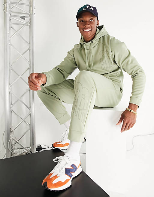 Hombre Joggers de ropa deportiva | Joggers color salvia con logo Tenacity exclusivos en ASOS de New Balance - LY41011