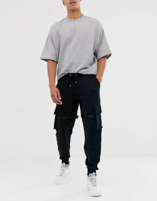 Joggers con diseño utilitario y detalle de múltiples bolsillos con tiras de ASOS DESIGN