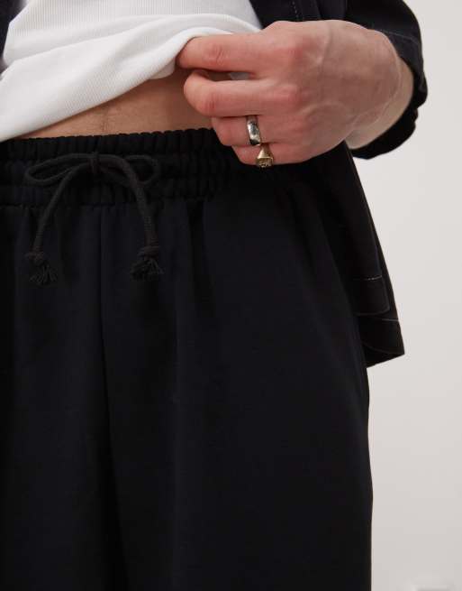Joggers cortos negros de corte skater holgado de punto liso de COLLUSION, 5 de 5