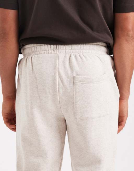 Joggers de chándal color avena jaspeado holgados de Cotton On, 4 de 5