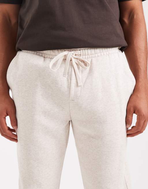 Joggers de chándal color avena jaspeado holgados de Cotton On, 5 de 5