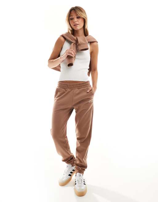 Joggers de chándal marrones con logo de Armani EA7 (parte de un conjunto)