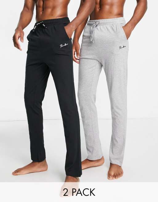 Joggers de estar por casa de color negro y gris de corte slim con logo de texto de Threadbare