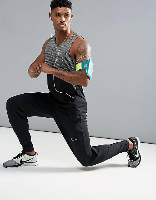 Joggers de en negro 857838-010 Dri-FIT de Nike Running | ASOS