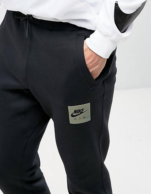Pantano poco claro Diacrítico Joggers de polar en negro Air Heritage 832164-010 de Nike | ASOS