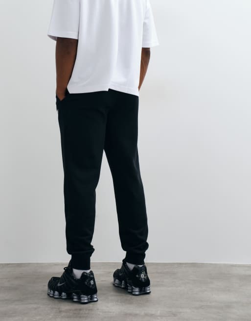 Joggers de rizo francés con puños ajustados en negro Club de Nike, 3 de 5