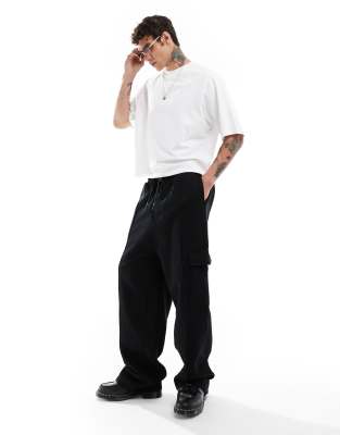 Joggers de vestir cargo negros de tejido grueso de ASOS DESIGN