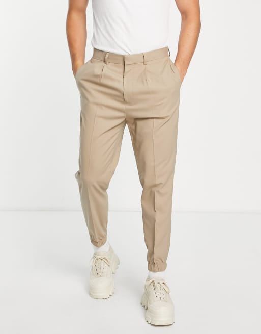 Joggers de vestir color piedra de corte tapered de ASOS DESIGN