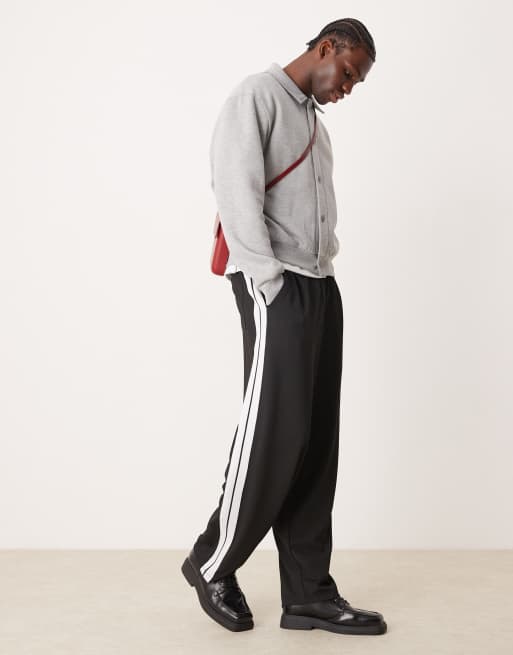 Joggers de vestir negros muy holgados con detalle de cinta de ASOS DESIGN