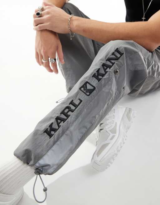 Joggers deportivos gris reflectante de pernera ancha de estilo retro de Karl Kani, 3 de 5