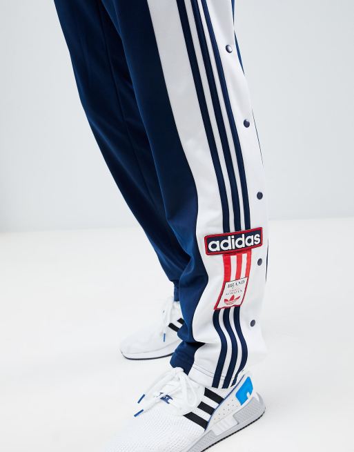 embargo gramática pintor Joggers en azul marino con botones de presión Adibreak CZ0678 de adidas  Originals | ASOS