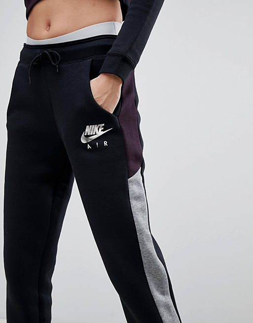 Deber Cadena calentar Joggers en negro y color vino de Oporto de Nike Air | ASOS