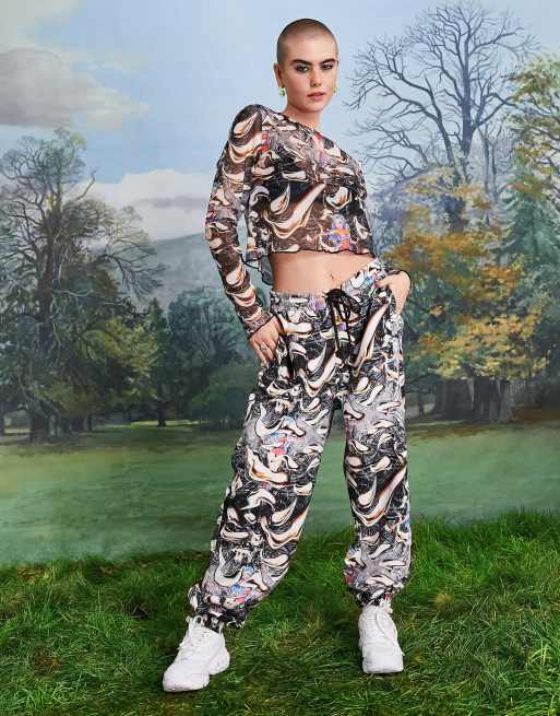 Joggers extragrandes con diseño estampado de COLLUSION Unisex (parte de un conjunto)