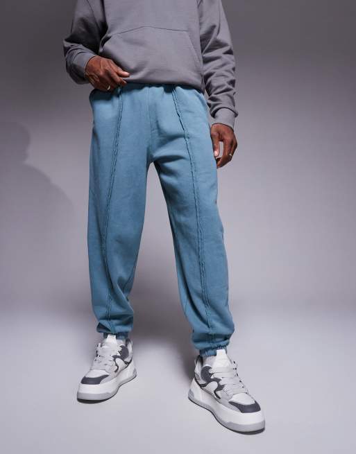 Joggers extragrandes con lavado azul y detalle de costura de ASOS DESIGN, 2 de 5
