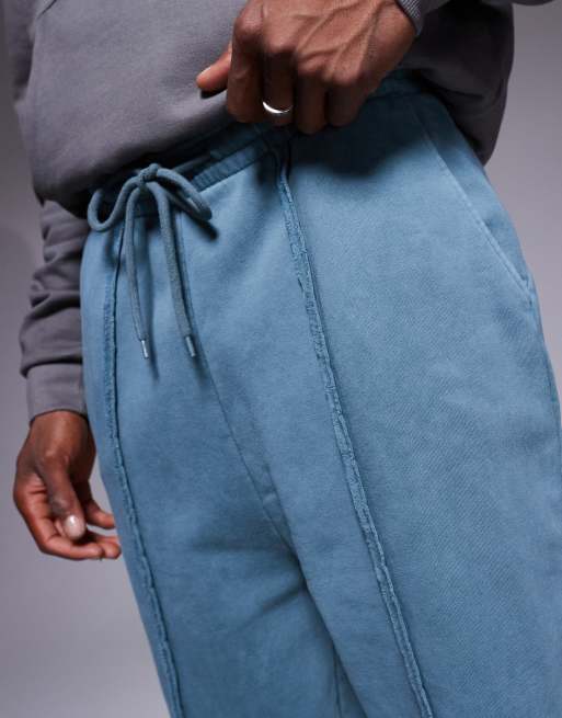 Joggers extragrandes con lavado azul y detalle de costura de ASOS DESIGN, 3 de 5