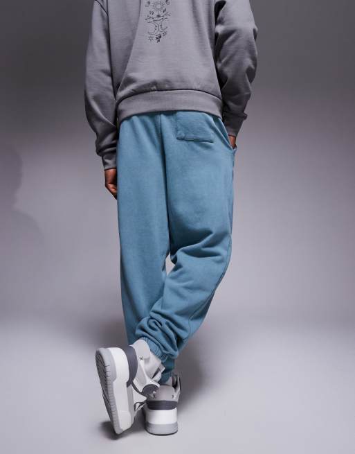 Joggers extragrandes con lavado azul y detalle de costura de ASOS DESIGN, 4 de 5