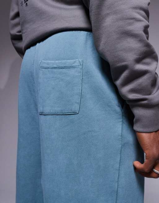 Joggers extragrandes con lavado azul y detalle de costura de ASOS DESIGN, 5 de 5