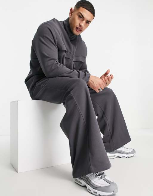 Joggers extragrandes con lavado negro y pernera ancha de ASOS DESIGN (parte de un conjunto)