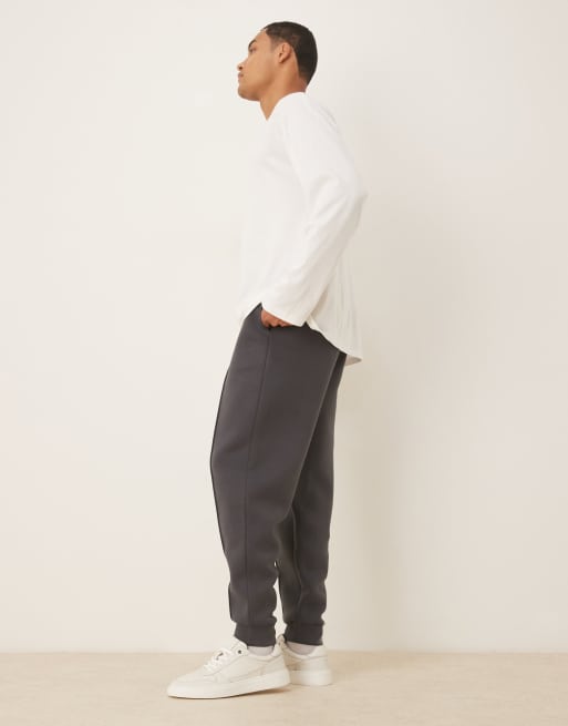 Joggers gris carbón de corte tapered con nervios de tejido grueso efecto neopreno de ASOS DESIGN , 3 de 5