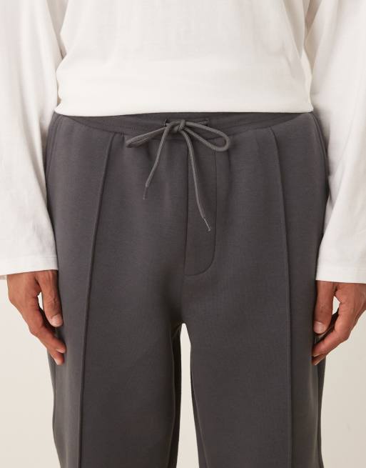 Joggers gris carbón de corte tapered con nervios de tejido grueso efecto neopreno de ASOS DESIGN , 4 de 5