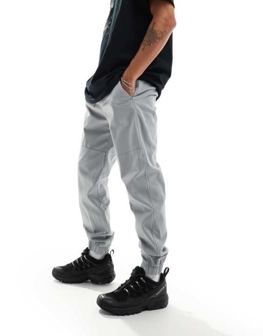 Joggers gris claro de corte pitillo con bajos elásticos de algodón y nailon de Hollister