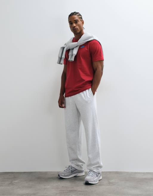 Joggers gris claro extragrandes con bajos abiertos de felpa rizada de Nike Club, 4 de 5
