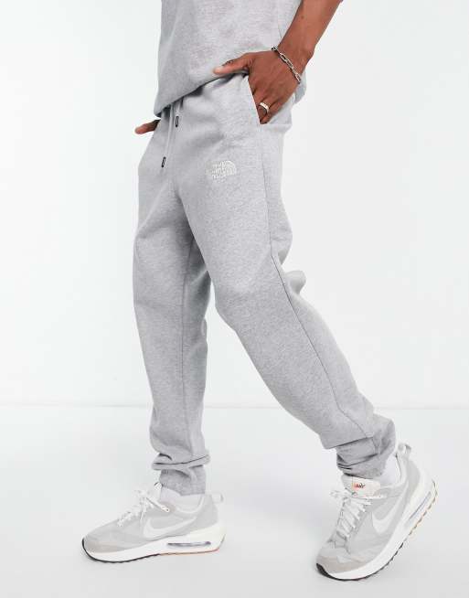 Joggers gris jaspeado b sicos exclusivos en ASOS de The North Face