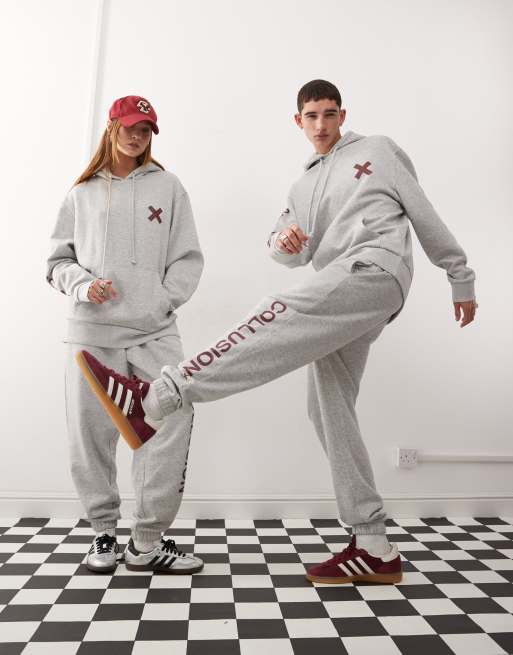 Joggers gris jaspeado con logo y estampado burdeos de COLLUSION Unisex