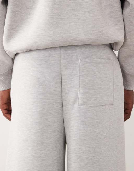 Joggers gris jaspeado de pernera muy ancha de tejido grueso efecto neopreno de ASOS DESIGN, 4 de 5