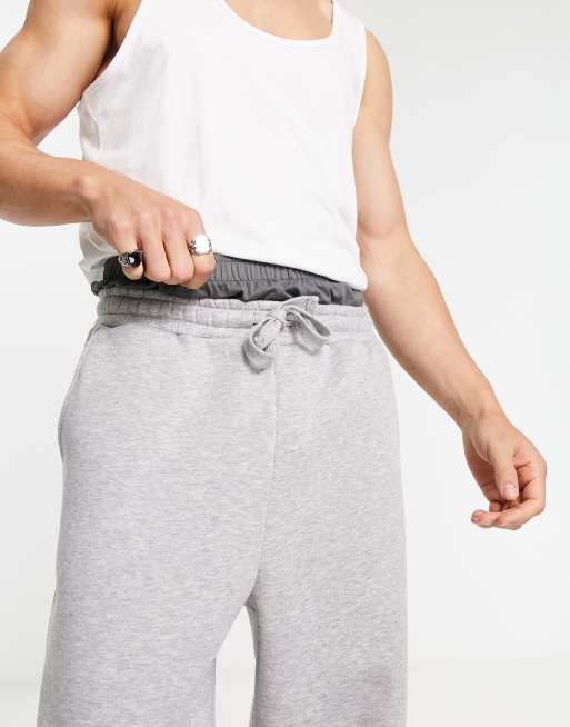 Joggers gris jaspeado extragrandes de pernera ancha con detalle de bóxer de ASOS DESIGN, 3 de 4