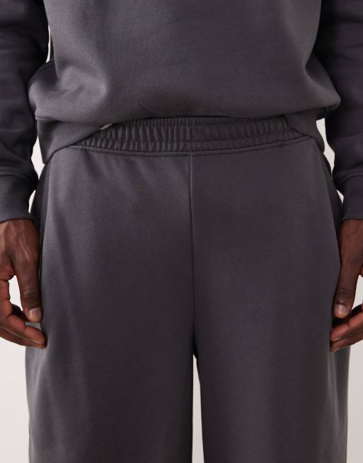 Joggers gris oscuro de pernera ancha con pinzas de ASOS DESIGN, 5 de 5
