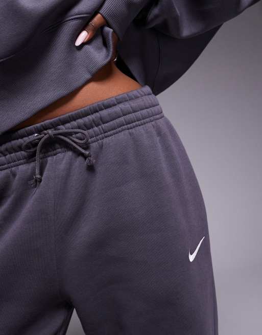 Joggers gris oscuro extragrandes de talle alto con bajos ajustados Phoenix Fleece de Nike , 4 de 5