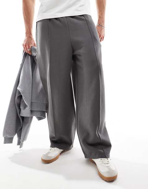 Joggers grises de corte bombacho extragrande con jaretas de ASOS DESIGN - view 1