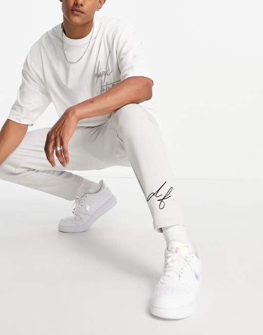 Joggers grises de corte tapered con logo estampado de ASOS Dark Future (parte de un conjunto)
