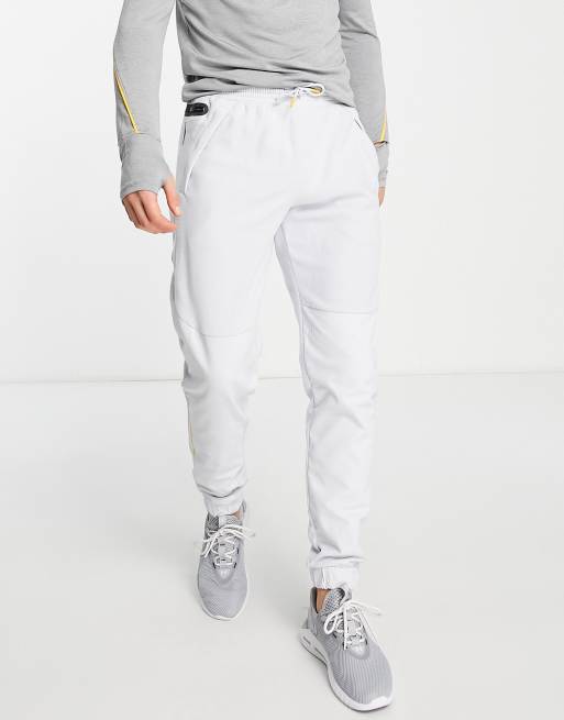 UNDER ARMOUR Under Armour RUSH - Pantalón de chándal hombre grey