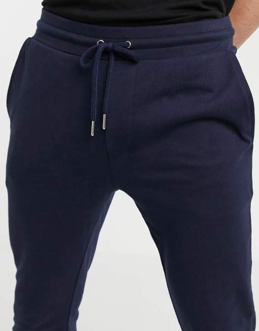 Joggers ligeros y ajustados en azul marino de ASOS DESIGN, 3 de 4