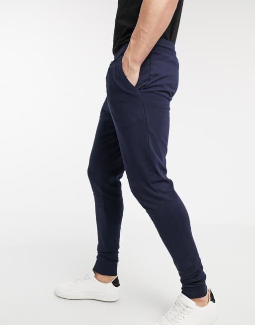 Joggers ligeros y ajustados en azul marino de ASOS DESIGN, 4 de 4