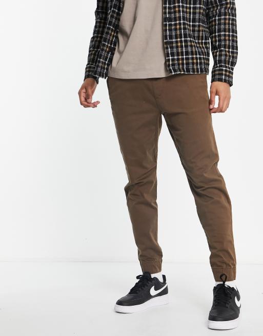 Joggers marrones de corte pitillo de Hollister
